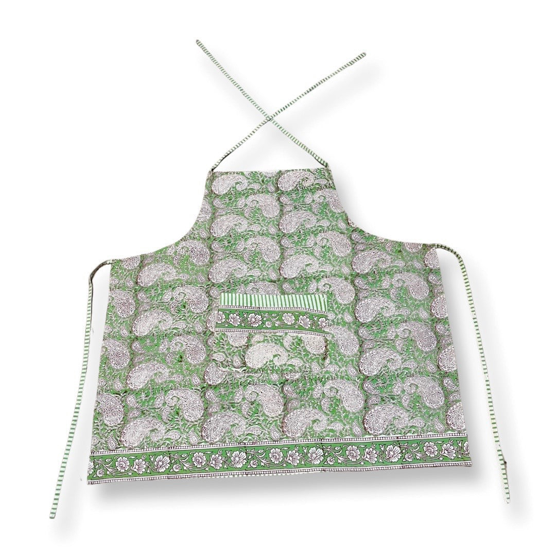 Hand block printed aprons for kids and adults. Matching green and blue paisley designs.